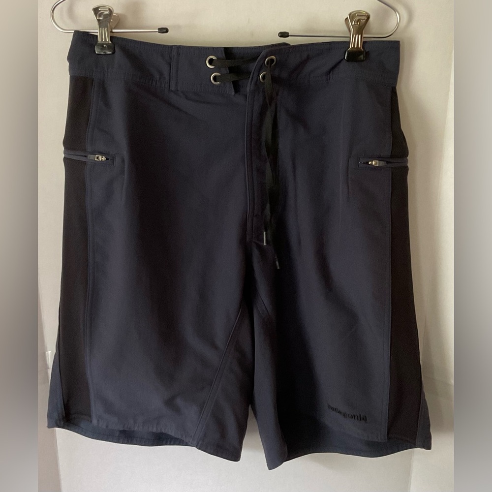 Patagonia blue and black drawstring board shorts size 28 zip pockets